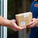 SwiftTrack courier handing over a parcel (416x288)